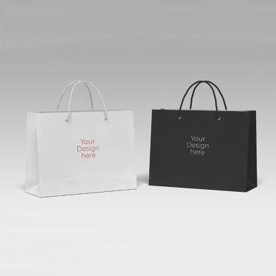 China Recyclable Luxury Custom Size Package Paper Handle Paper Bag Kraft Paper Shopping Bag for sale