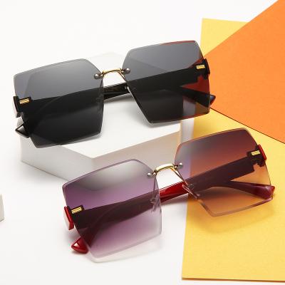 China Fashion Sun Glasses Ladies Sunglasses 2022 Fashion Sun Glasses Girl Women Girl Rimless Cute Sunglasses for sale