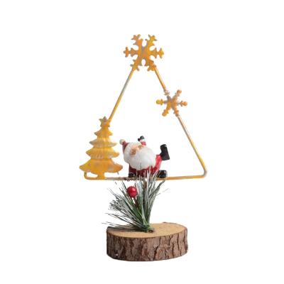 China Decoration Make Christmas Decorative Resin Santa Clause Christmas Santa Metal Frame Base Ornament Wood for sale