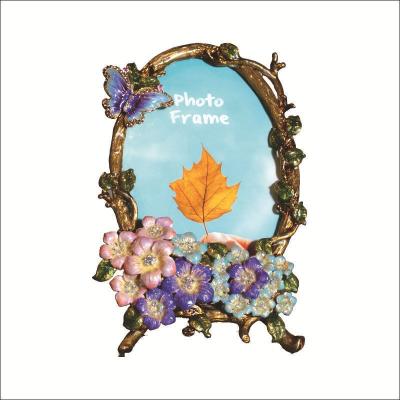 China Home Decor Innovative Home Table Decoration Metal Flower Photo Frame 6 Inch for sale