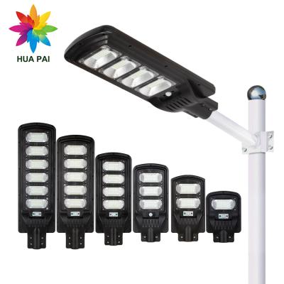 China Road HUAPAI 100 150 200 250 300W Remote Control Road Ip65 50 Aluminum Waterproof All In One Led Solar Street Light for sale