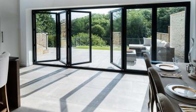 China Balcony Ultra Slim Aluminium Bifold Doors Insulating Glass With Light Rail for sale