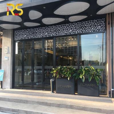 China Hotel Modern Black Steel Framed Glass Main Doors for sale