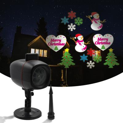 China Residential Christmas Projector Lights Outdoor Indoor HD 12 Slides LED Projection Lamp For Christmas Gifts Snowflake Light Waterproof Decor for sale