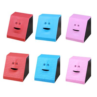 China Lelyi Yiwu Plastic Free Shipping Face Eating Coin Saving Box Face Money Bank Crawling Piggy Bank for sale