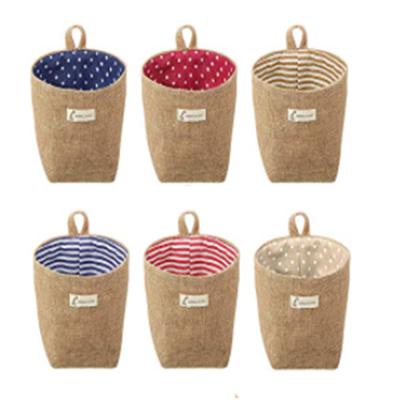 China Sustainable Cotton Jute Storage Basket Wall Hanging Hanging Baskets For Plants Indoor Canvas Basket for sale