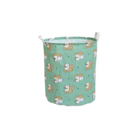 China Round Canvas Viable Toy Storage Bins Basket With Folding Handle Toy Stuffed Animal Holder for sale