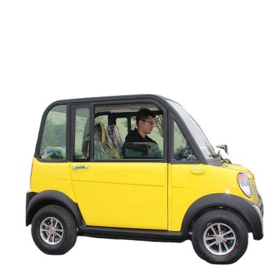 China 4 wheel 2 seat white autos electric good quality eco-friendly tour electric car 4.50-10 for sale