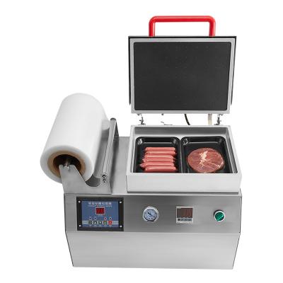 China Plastic Food Vacuum Skin Package Machine Tray Sealer Packaging Machine For Seafood for sale