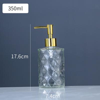 China Wall Mount Shower Pump Dispenser Fashion Design Desktop Tabletop Hand Soap Free Liquid Dispenser Boston Glass Clear Push Round Glass Bottles Stainless Steel Pumps for sale