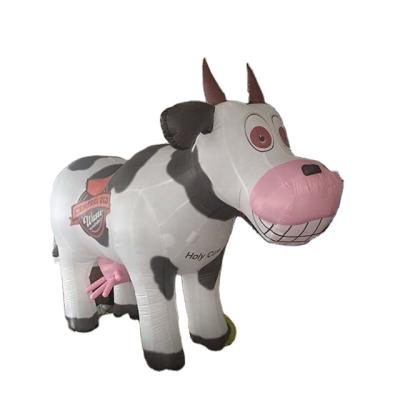 China Oxford cloth cartoon dairy cattle inflatable decoration inflatable cow costume event for cow farm for sale