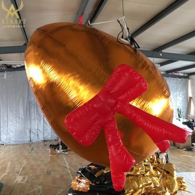 China PVC Tarpaulin/Oxford Cloth/Optional 2m Golden Hanging Inflatable Egg Balloon With Bowknot Easter Holiday Party Supplies for sale