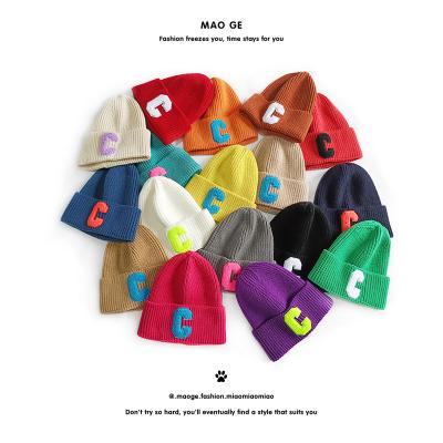 China COMMON custom wholesale pom beanie cute teens knitted beanie hats for sale