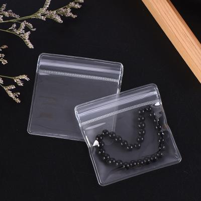 China Custom Mini Zipper Pouch Jewelry Necklace Clear PVC Jewelry Moisture Proof Packaging Bag Biodegradable Zipper Bag for sale