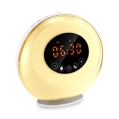 China LUMINOVA Simulation Sunrise Wake Up Light Alarm Clock Speaker with FM Radio Electric Alarm Clock for Kids for sale