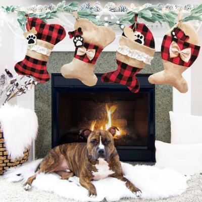 China Polyester Christmas Decoration Supplies Bulk Christmas Plaid Dog Bone Red And Black Stocking for sale