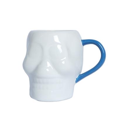 China CREATIVE White Luminous Ceramic Blue Handle Coffee Mug Skeleton Chandelier Skull Halloween Coffee Mug Custom Made for sale