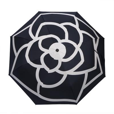 China Retro Camellia Umbrella Anti-Ultraviolet Sun And Rain Traditional Triple Automatic Umbrella Black Rubber Umbrella for sale