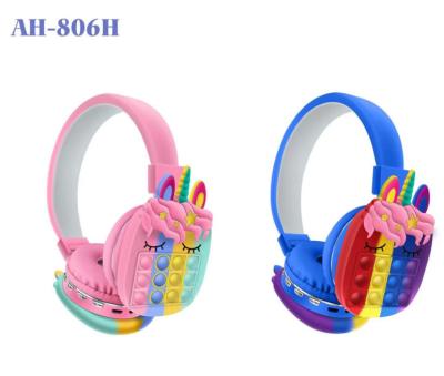 China New portable waved headband unicorn wireless headphones gift stereo music pops BT headphone push bubblle wave wireless headphones for sale