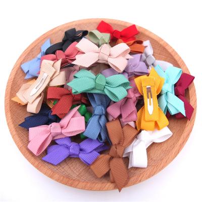 China Mini Bow Hair Clips Tiny Hairbow Boutique Hair Clips Toddler Bow 4.5CM Snap Infant Hair Bow Accessories Lovely Baby Shower Gift for sale