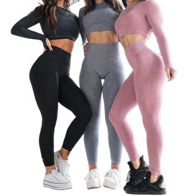 China 2022 New Yoga Fitness Clothes Seamless Women Suit Breathable Yoga Tops Tight High Waist Hip Sports Lifting Yoga For Women 2 Piece Sets for sale