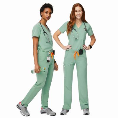 China 2021 Hospital Beauty Design Us Fashionable Private Label Work Stretch Nurse Tops Sets Medical Custom Care Scrubs Uniforms Sets for sale