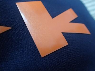 China Custom Shiny Orange TPU Iron On Clothing Patches , Heat Transfer Shoe Label for sale