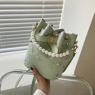 China Luxury Fashion Designer Lady Shoulder Bag Pearl Handle Women Bucket Bag With Embroidery for sale