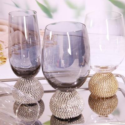 China Viable Red Wine Glass Hand Blown Crystal Clear Premium Wedding Champagne Water Glass With Hand Paste Applied Drill for sale