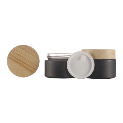 China Cosmetic Cosmetic Packaging 5g 10g15g 20g 30g 50g Matt Black Glass Face Cream Jar With Bamboo Lid for sale