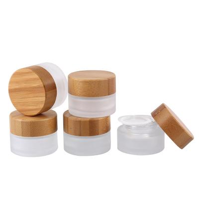 China 5g cosmetic empty 10g 15g 20g 25g 30g 50g 60g 100g frosted face cream round glass jar with bamboo lid for sale