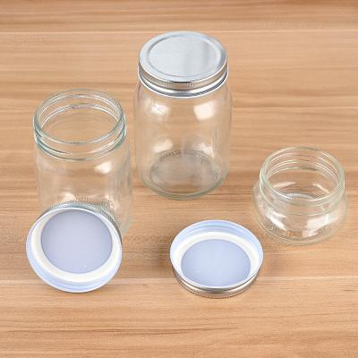 China Stackable Airtight Clear Freshness Preservation Supply Glass Tea Tank Storage Jar Food Storage Jar With Colored Lids for sale