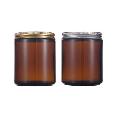 China Home Decoration Custom Luxury Amber Round Shape 4oz 8oz Glass Candle Jars Bulk With Gold Or Silver Lid for sale