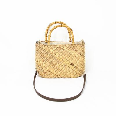 China Fashion Bamboo Handle Water Hyacinth Hand - Woven Women Straw Beach Bag Shoulder Bag for sale