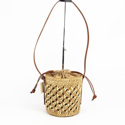 China Fashion New Straw Paper Bag Hollowed Out Elegant Bucket Bag for sale