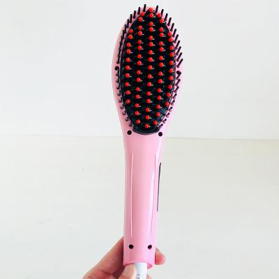 China Anti-scalded Teeth LCD Temperature Display Electric Hair Straightener Brush for sale