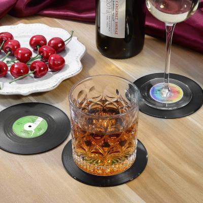 China Viable custom vintage vinyl coaster set of 6 pieces of plastic coaster with silicone slip ring in stock for sale