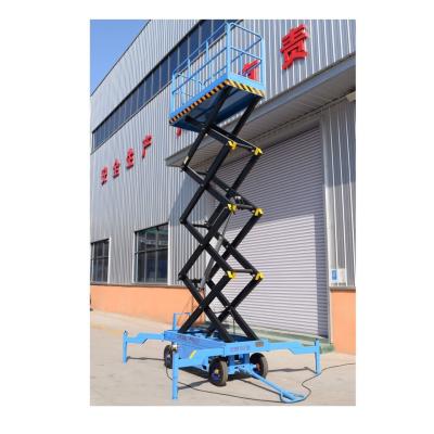 China 320kg hydraulic lifting platform scissor lift home small movable hydraulic lift for sale