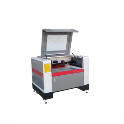 China Laser CUTTING CO2 6090 Laser Cutting Machine 150w 130w CO2 Laser Cutting Machine for sale