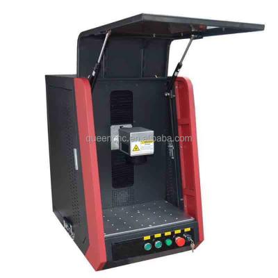 China Enclosed type small enclosed fiber laser marking machine fiber laser marking machine and metal laser marking machine mopa fiber laser marking machine for sale