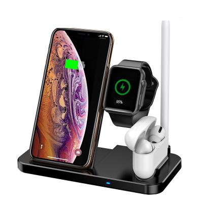 China Earphone 4 in 1 multi-function wireless fast charging mobile phone holder charging station wireless charger for sale