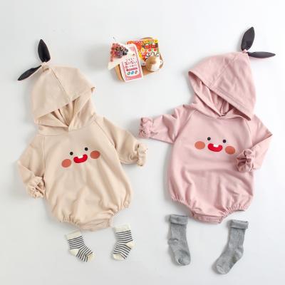 China Casual Korean Version Solid Color Cute Smile Face Printed Full Sleeve Triangle Hooded Rompers For Newborn Baby Girl for sale