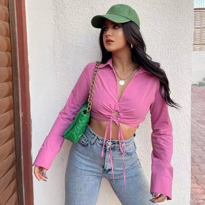 China 2022 New Sale Anti-Wrinkle Solid Color Sexy Women Exposed Navel Drawstring Front Edge Asymmetrical Crop Cut Out Women's T-shirts Long Sleeve for sale