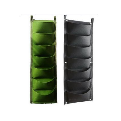 China Beautiful Decoration High Quality Felt Garden Grow Bag 7 Multi Pockets Felt Wall Hanging Planter Vertical Garden Grow Bags for sale