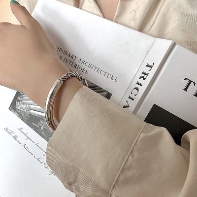 China 2022 TRENDY New Popular Vintage Spiral Splicing Stainless Steel Mental Adjustable Cuff Bracelets For Men And Women for sale