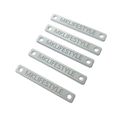 China Sustainable Metal Label For Shoes Metal Tags For Clothes Brand Labels For Apparel Customized Logos Label Tag Clothing for sale