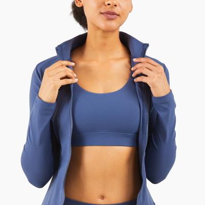 China Anti-Wrinkle Women's Long Sleeve Seamless Sportswear Coat Sporty Running Collar Slim Fit Heat Yogawear Top for sale