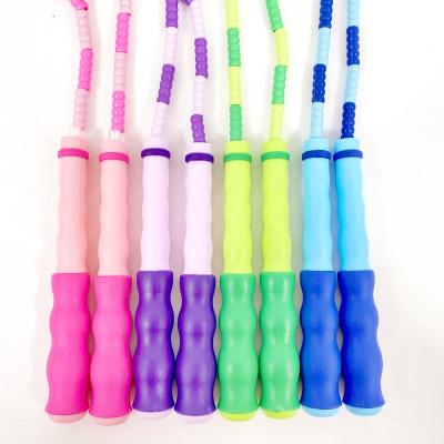 China Strength Training Hot Selling Kids Rainbow Beads Soft Plastic And Premium Adjustable Jump Rope for sale