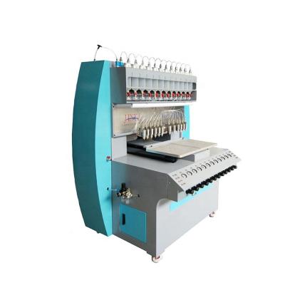 China Garment Shop JY-B02 Full Automatic PVC Rubber Patch Drip Machine For Sale for sale