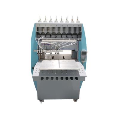 China Magazines Printing Molding Zipper Metal Parts Horizontal Rubber Molding Injection Making Label Patch Dropping Machine for sale